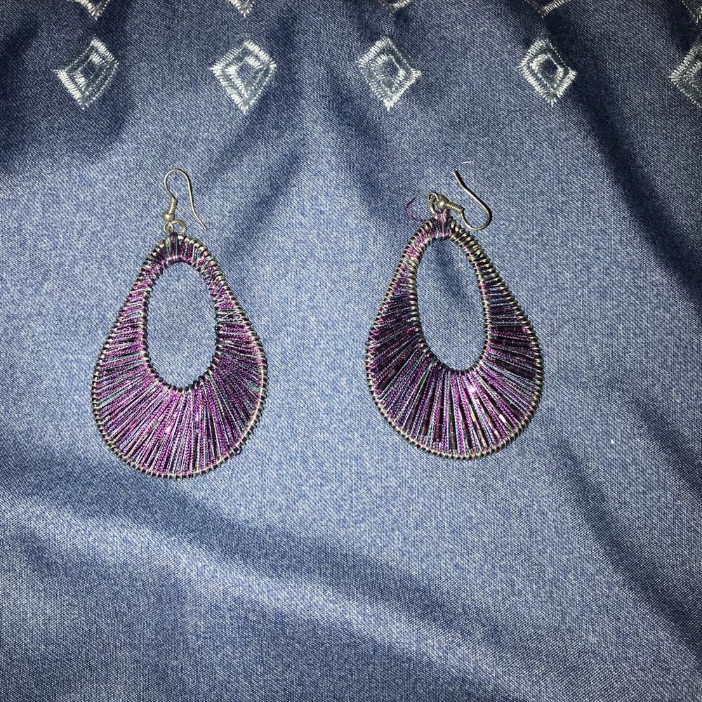 Purple mixed material earrings.